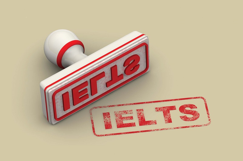 Red seal and imprint "IELTS" on white surface